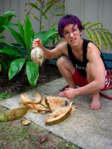 Behold! I have slain the mighty coconut with my pointed stick and smashy rock! Also notice my squat depth!